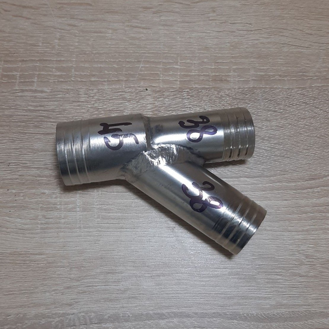 Трійник водяний (метал) Газель, УАЗ дв. 4216 (на помпу, термостат, радіатор)
